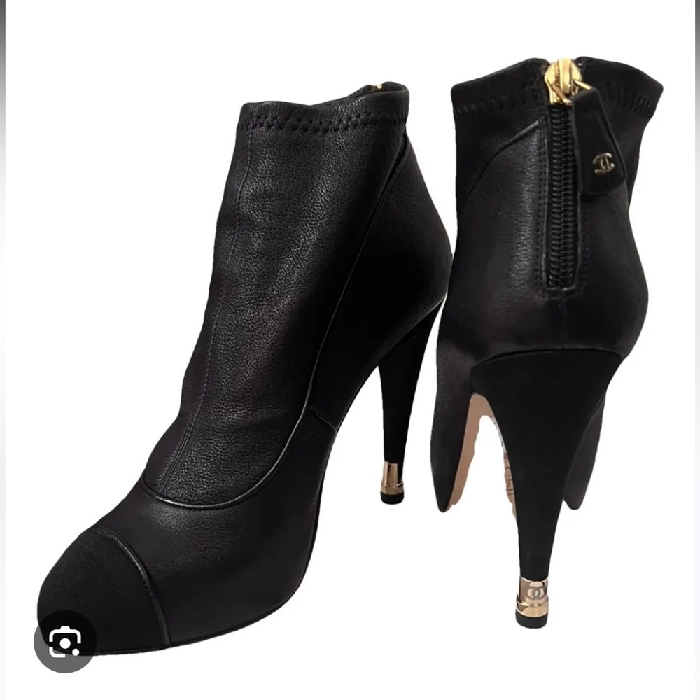 CHANEL Black Heeled Boots with Gold Accents